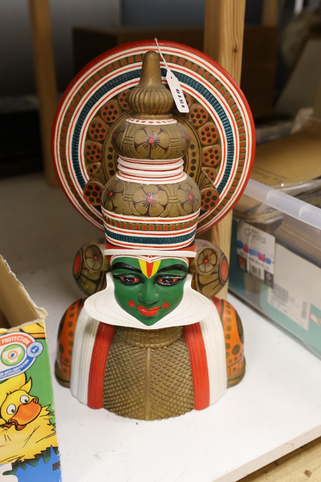 A painted deity, 50 cms high.